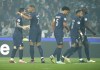 PSG's Lionel Messi ,left, celebrates with PSG's Kylian Mbappe and his teammates after scoring his side's opening goal during the French League One soccer match between Lyon and Paris Saint Germain at Groupama stadium in Decines, outside Lyon, central France, Sunday, Sept. 18, 2022. (AP Photo/Laurent Cipriani)