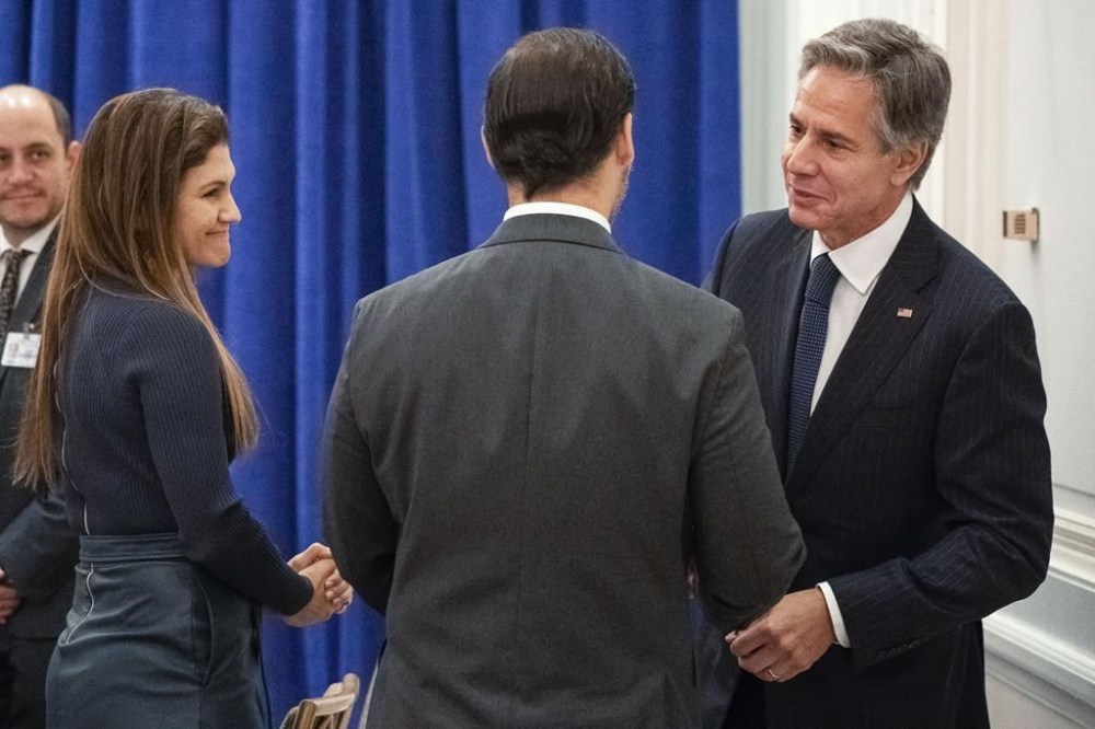 Secretary of State Antony Blinken greets members of the panel prior before the Alliance for Development in Democracy ministerial meeting during the 77th session of the United Nations General Assembly in New York, Tuesday, Sept. 20, 2022. (David Dee Delgado/Pool Photo via AP)
