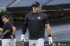 New York Yankees' Harrison Bader walks by the batting cage before a baseball game against the Pittsburgh Pirates,Tuesday, Sept. 20, 2022, in New York. (AP Photo/Jessie Alcheh)