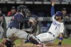 Kansas City Royals' MJ Melendez (1) is tagged out an home by Minnesota Twins catcher Gary Sanchez as he tried to score on a double by Bobby Witt Jr. during the seventh inning of a baseball game Tuesday, Sept. 20, 2022, in Kansas City, Mo. (AP Photo/Charlie Riedel)