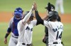 Miami Marlins' Nick Fortes, left, celebrates with Bryan De La Cruz (14) after hitting a two-run home run during the fifth inning of the team's baseball game against the Chicago Cubs, Wednesday, Sept. 21, 2022, in Miami. (AP Photo/Lynne Sladky)