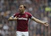 FILE - West Ham's Mark Noble complains about a referee's decision during the English Premier League soccer match between Tottenham Hotspur and West Ham United at White Hart Lane in London, Saturday, April, 27, 2019. Mark Noble’s journey with West Ham is far from over. Noble — fondly referred to as “Mr. West Ham” after spending 18 years with the team as a player — will take up a newly created role as the club’s sporting director from January, West Ham said Thursday, Sept. 22, 2022. (AP Photo/Alastair Grant, File)