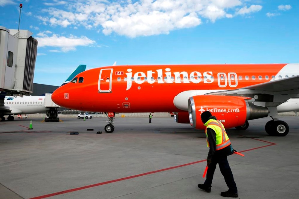 A Canada Jetlines Airbus A320 jet pulls up to the Calgary airport gate on the airline's inaugural flight at Calgary, Alta., Thursday, Sept. 22, 2022. THE CANADIAN PRESS/Larry MacDougal