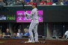 Los Angeles Angels' Shohei Ohtani stands on deck in the eighth inning of a baseball game against the Texas Rangers in Arlington, Texas, Thursday, Sept. 22, 2022. (AP Photo/Tony Gutierrez)