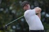 Taylor Pendrith, of Canada, hits the ball off the 13th tee during their foursomes match at the Presidents Cup golf tournament at the Quail Hollow Club, Thursday, Sept. 22, 2022, in Charlotte, N.C. (AP Photo/Julio Cortez)