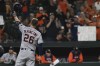 Houston Astros' Trey Mancini (26) waves to the crowd during a second-inning at-bat against the Baltimore Orioles in a baseball game Thursday, Sept. 22, 2022, in Baltimore. (AP Photo/Tommy Gilligan)