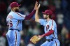 Philadelphia Phillies pitcher Jose Alvarado, left, and center fielder Matt Vierling celebrate after a baseball game against the Atlanta Braves, Thursday, Sept. 22, 2022, in Philadelphia. (AP Photo/Matt Slocum)