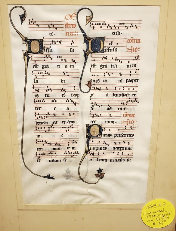 This photo provided by Will Sideri shows a 700-year-old manuscript that was used in the Beauvais Cathedral in France. Sideri bought the medieval manuscript for $75 at an estate sale on Sept. 3, 2022, in Waterville, Maine. An expert on manuscripts said the document, first reported by the Maine Monitor, could be worth as much as $10,000. (Will Sideri via AP)