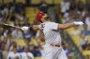 St. Louis Cardinals designated hitter Albert Pujols (5) hits a foul ball during the first inning of a baseball game against the Los Angeles Dodgers in Los Angeles, Friday, Sept. 23, 2022. (AP Photo/Ashley Landis)
