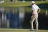 Corey Conners, of Canada, reacts to missing his putt on the 13th green during their foursomes match at the Presidents Cup golf tournament at the Quail Hollow Club, Saturday, Sept. 24, 2022, in Charlotte, N.C.&nbsp;Conners and partner Sungjae Im of South Korea have lost the first match of the day at the Presidents Cup.THE CANADIAN PRESS/AP-Julio Cortez