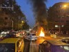 FILE - In this Sept. 19, 2022, photo taken by an individual not employed by the Associated Press and obtained by the AP outside Iran, a police motorcycle burns during a protest over the death of a young woman who had been detained for violating the country's conservative dress code, in downtown Tehran, Iran. Iran’s Foreign Ministry said Sunday, Sept. 25, 2022, that it summoned Britain's ambassador to protest what it described as a hostile atmosphere created by London-based Farsi language media outlets, amid violent unrest in Iran triggered by the death of the young woman in police custody. (AP Photo, File)