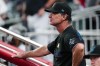 Miami Marlins manager Don Mattingly looks on from the dugout during a baseball game against the Atlanta Braves, Friday, Sept. 2, 2022, in Atlanta. (AP Photo/John Bazemore)