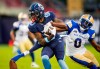 Toronto Argonauts' DaVaris Daniels (80) makes a reception as Winnipeg Blue Bombers' Les Maruo tries to defend during the first half of CFL football action in Toronto on July 4, 2022. The Blue Bombers and Argonauts can both secure home playoff games this weekend. THE CANADIAN PRESS/Mark Blinch
