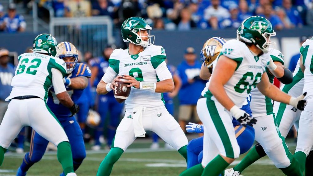 Saskatchewan Roughriders quarterback Jake Dolegala (9) throws against the Winnipeg Blue Bombers during the second half of CFL football action in Winnipeg Saturday, Sept. 10, 2022. The Saskatchewan Roughriders suspended Dolegala for one game Monday after he was arrested and charged with impaired driving. THE CANADIAN PRESS/John Woods