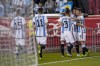 Argentina's players celebrate their first goal scored by Julian Alvarez (9) during the first half of an international friendly soccer match against Jamaica on Tuesday, Sept. 27, 2022, in Harrison, N.J. (AP Photo/Eduardo Munoz Alvarez)
