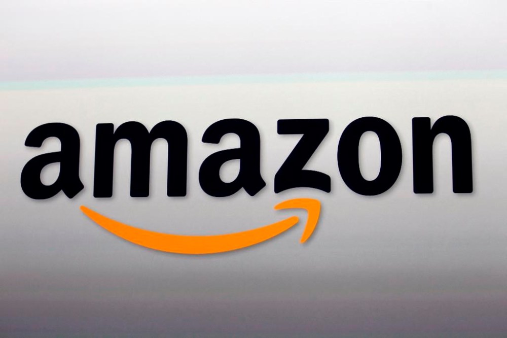 FILE - This Sept. 6, 2012, file photo, shows the Amazon logo in Santa Monica, Calif. The e-commerce and tech giant said Wednesday, Sept, 28, 2022, that it will release a device that can track sleeping patterns. The Halo Rise device will use no-contact sensors and artificial intelligence to measure a user’s movement and breathing patterns. (AP Photo/Reed Saxon, File)
