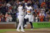 Houston Astros Trey Mancini, left, and Chas McCormick celebrate after they both score on the two run home run by McCormick during the fifth inning of a baseball game against the Arizona Diamondbacks Wednesday, Sept. 28, 2022, in Houston. (AP Photo/Michael Wyke)