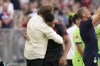 FILE - Bayern's head coach Julian Nagelsmann hugs Bayern's Jamal Musiala after he was substituted during the German Bundesliga soccer match between FC Bayern Munich and VfL Wolfsburg in Munich, Germany, on Aug. 14, 2022. The international break provided little respite for Bayern Munich’s shaken stars ahead of the team’s high-stakes Bundesliga clash with Bayer Leverkusen on Friday. Nagelsmann welcomed Germany players back to training on Wednesday Sept. 28, 2022 after what proved to be a frustrating two games with the national team. (AP Photo/Matthias Schrader, File)