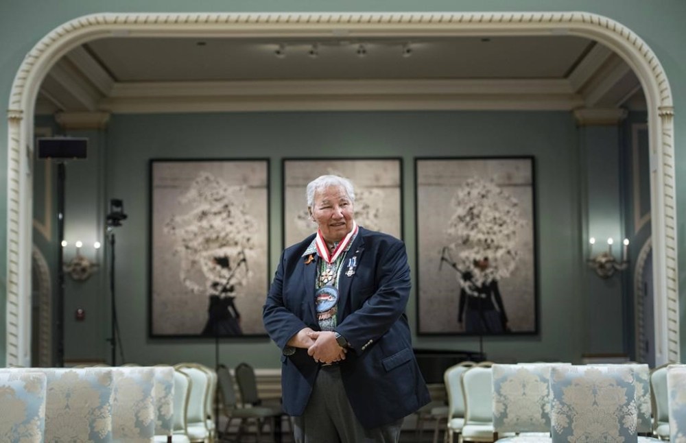 Justice Murray Sinclair, who was Manitoba’s first Indigenous judge, led the Truth and Reconciliation Commission and served as a senator, stands in the ballroom at Rideau Hall after being invested as a companion of the Order of Canada and receiving a Meritorious Service Decoration (Civil Division), in Ottawa, Thursday, May 26, 2022. Sinclair says the argument the federal government made in 2015 that the Catholic Church was unlikely to raise the money it promised to residential school survivors is