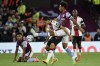 Aston Villa's Boubacar Kamara, center right, vies for the ball with Southampton's Mohamed Elyounoussi during the English Premier League soccer match between Aston Villa and Southampton at Villa Park in Birmingham, England, Friday, Sept. 16, 2022. (AP Photo/Rui Vieira)