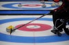 Canada's Mark Ideson helps a teammate to line up a push during their wheelchair curling competition against Norway at the 2022 Winter Paralympics, Thursday, March 10, 2022, in Beijing. A pair of world wheelchair curling championships will be held March 4-12 in Richmond, B.C., the World Curling Federation announced Friday.THE CANADIAN PRESS/AP/Dita Alangkara