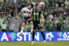 Vancouver Whitecaps FC midfielder Ryan Raposo, left, and Austin FC midfielder Ethan Finlay (13) leap for the ball during the first half of an MLS soccer match on April 23, 2022, in Austin, Texas. THE CANADIAN PRESS/AP, Eric Gay