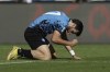 Napoli's Khvicha Kvaratskhelia celebrates after scoring his side's third goal during the Serie A soccer match between Napoli and Torino, at the Diego Armando Maradona stadium in Naples, Italy, Saturday, Oct. 1, 2022. (Alessandro Garofalo/LaPresse via AP)