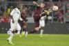 Bayern's Joshua Kimmich, right, controls the ball during the German Bundesliga soccer match between FC Bayern Munich and Bayer 04 Leverkusen at the Allianz Arena in Munich, Germany, Sept. 30, 2022. (AP Photo/Matthias Schrader)