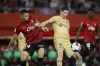 Barcelona's Robert Lewandowski, right, is challenged by Mallorca's Martin Valjent during a Spanish La Liga soccer match between Mallorca and Barcelona at the Son Moix stadium in Palma de Mallorca, Spain, Saturday, Oct. 1, 2022. (AP Photo/Francisco Ubilla)