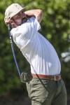 Mark Hubbard watches his drive from the first tee during the third round of the Sanderson Farms Championship golf tournament in Jackson, Miss., Saturday, Oct. 1, 2022. (James Pugh/impact601.com via AP)