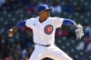 Chicago Cubs starter Marcus Stroman delivers a pitch during the first inning of a baseball game against the Cincinnati Reds, Sunday, Oct. 2, 2022, in Chicago. (AP Photo/Paul Beaty)