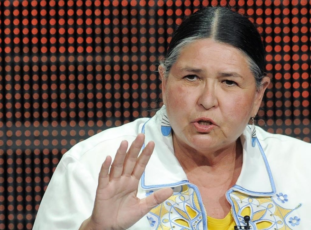 FILE - Activist and actress Sacheen Littlefeather takes part in a panel discussion on the PBS special