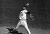 FILE - Baltimore pitcher Jim Palmer (22) delivers during a World Series game, Monday, Oct. 11, 1971, in Baltimore, Md. Palmer pitched 25 complete games in 1975. The entire major leagues have combined for 35 this year, down from 50 last season and 622 in 1988. (AP Photo/File)
