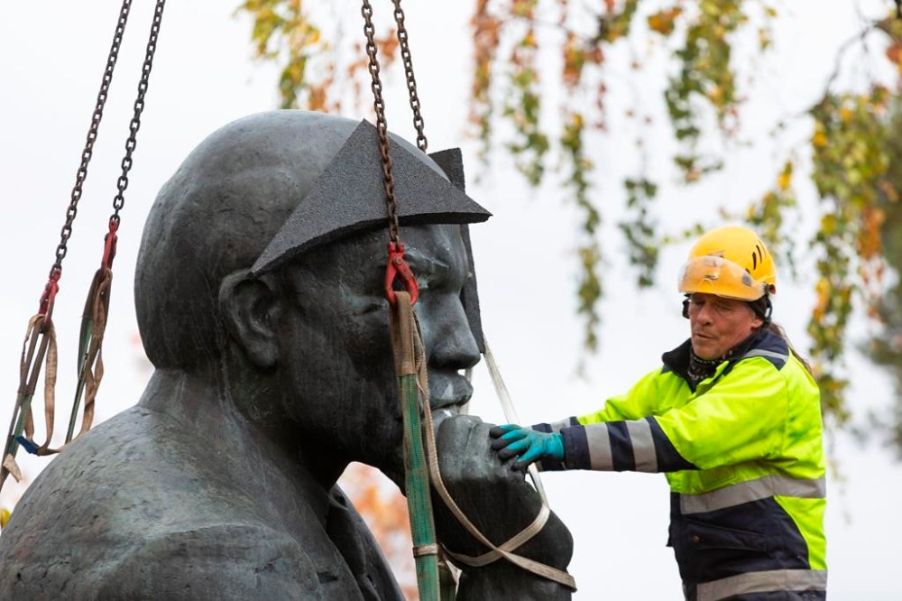 A statue of Vladimir Lenin is removed from the streets of the city of Kotka, Finland Tuesday, Oct. 4, 2022. The southeastern Finnish city of Kotka on Tuesday removed the last publicly displayed statue of Russian bolshevik leader Vladimir Lenin in the Nordic country due to increasing pressure from residents in the wake of Russia’s war in Ukraine. (Sasu Makinen/Lehtikuva via AP)