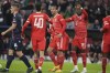 Bayern's Leroy Sane, center, celebrates with his teammates after scoring against Pizen during the Champions League group C soccer match between Bayern Munich and Viktoria Plzen in Munich, Germany, Tuesday, Oct. 4, 2022. (AP Photo/Matthias Schrader)