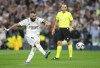 Real Madrid's Karim Benzema shoots from the penalty spot during the Spanish La Liga soccer match between Real Madrid and Osasuna at the Santiago Bernabeu stadium in Madrid, Spain, Sunday, Oct. 2, 2022. (AP Photo/Manu Fernandez)