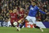 Liverpool's Darwin Nunez, left, and Rangers' Connor Goldson challenge for the ball during the Champions League Group A soccer match between Liverpool and Rangers at Anfield stadium in Liverpool, England, Tuesday Oct. 4, 2022. (AP Photo/Rui Vieira)