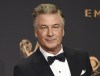 FILE - Alec Baldwin poses in the press room with the award for outstanding supporting actor in a comedy series for 