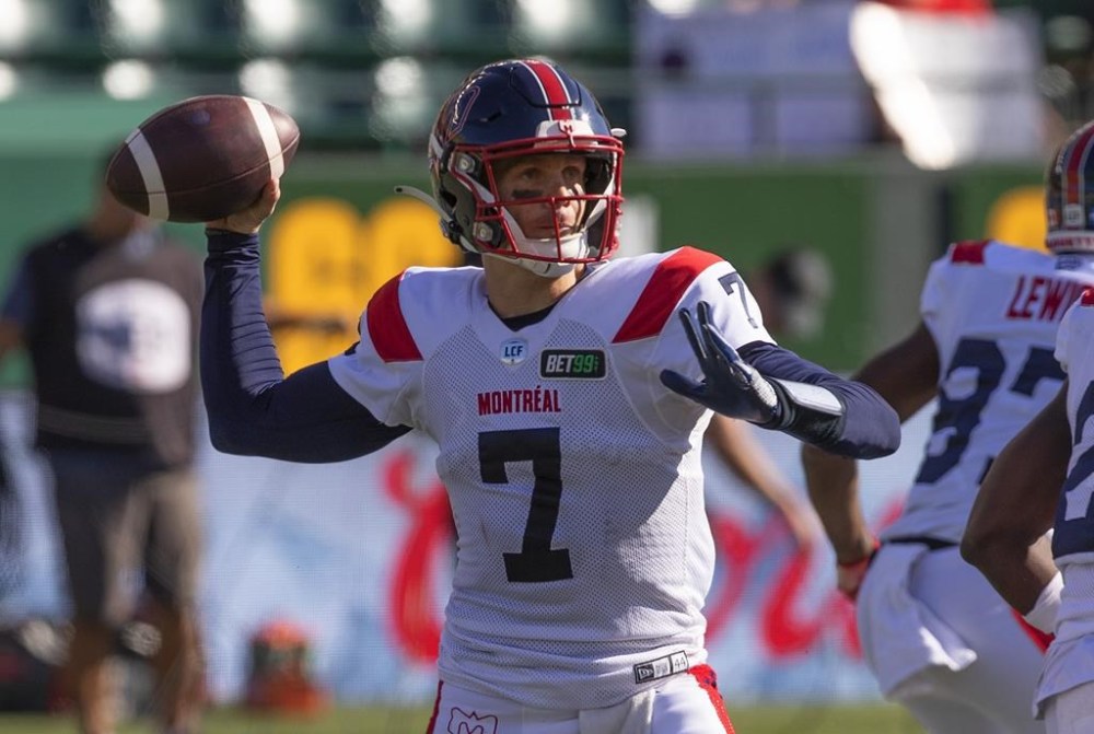 Montreal Alouettes quarterback Trevor Harris (7) makes the throw against the Edmonton Elks during first half CFL action in Edmonton, Alta., on Saturday October 1, 2022. THE CANADIAN PRESS/Jason Franson