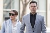 Canadian musician Jacob Hoggard arrives alongside his wife Rebekah Asselstine, for his sex assault trial at the Toronto courthouse on Tuesday, May 10, 2022 in Toronto. THE CANADIAN PRESS/Cole Burston