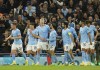 Manchester City's Erling Haaland, centre, celebrates with teammates after scoring his side's second goal during the Champions League soccer match between Manchester City and FC Copenhagen at the Etihad stadium in Manchester, England, Wednesday, Oct. 5, 2022. (AP Photo/Dave Thompson)