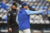 Kansas City Royals manager Mike Matheny talks with umpire Jordan Baker (71) during the fifth inning of a baseball game against the Detroit Tigers Saturday, Sept. 10, 2022, in Kansas City, Mo. (AP Photo/Jay Biggerstaff)