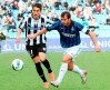 FILE - Inter Milan's Dejan Stankovic, right, and Udinese's Roberto Pereyra go for the ball during their Serie A soccer match at the Friuli Stadium in Udine, Italy, Wednesday, April 25, 2012. Former Lazio and Inter Milan midfielder Dejan Stankovic was appointed coach of last-place Serie A club Sampdoria on Thursday, Oct. 6, 2022. (AP Photo/Paolo Giovannini, File)