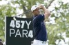 Bryson DeChambeau watches his tee shot on the fourth hole during the final round of the LIV Golf Invitational-Chicago tournament Sunday, Sept. 18, 2022, in Sugar Hill, Ill. (AP Photo/Charles Rex Arbogast)
