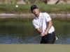 Justin Suh hits to the 17th green during the second round of the Shriners Children's Open golf tournament at TPC Summerlin, Friday, Oct. 7, 2022, in Las Vegas. (AP Photo/Ronda Churchill)