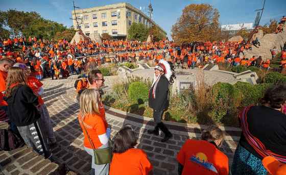 MIKE DEAL / WINNIPEG FREE PRESS Manitoba Keewatinowi Okimakanak Grand Chief Garrison Settee walks through the crowd as people gather for a ceremony at the Oodena Celebration Circle Friday morning at The Forks.
