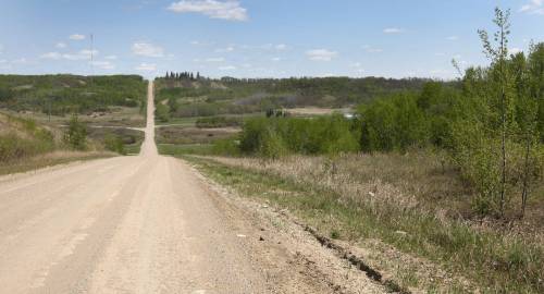 JOE BRYKSA / WINNIPEG FREE PRESS FILES
                                The road up the hill leaving Waywayseecappo First Nation. For years children were sent to residential schools; by 1960 most attended school in neighbouring Rossburn, with disastrous results.