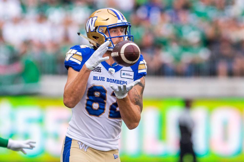 MATT SMITH / CFL PHOTO
Winnipeg Blue Bombers wide receiver Drew Wolitarsky (82) catches a pass during first quarter CFL action against the Saskatchewan Roughriders in Regina on Sunday.