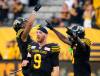 PETER POWER / THE CANADIAN PRESS
                                Hamilton Tiger Cats quarterback Dane Evans (9) begins to celebrate with teammates after defeating the Winnipeg Blue Bombers in CFL football action in Hamilton, Ont. on Saturday, September 17, 2022.