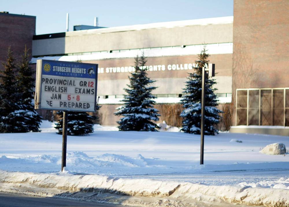 TREVOR HAGAN / WINNIPEG FREE PRESS FILES
                                Winnipeg Police Service officers attended Collège Sturgeon Heights Collegiate around 12:30 p.m. Monday, in response to a report about several people, including an adult male, being involved in a fight.